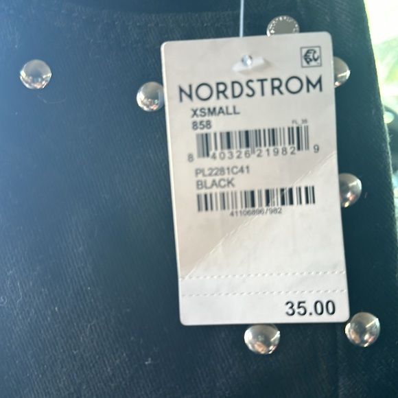 Ethikal brand black stud mini skirt. - Picture 2 of 3